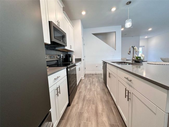 11455 Listening Drive, Townhouse with 4 bedrooms, 3 bathrooms and null parking in ORLANDO FL | Image 5