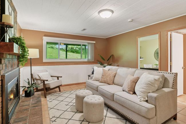 Wood ceiling and wainscoting. | Image 26