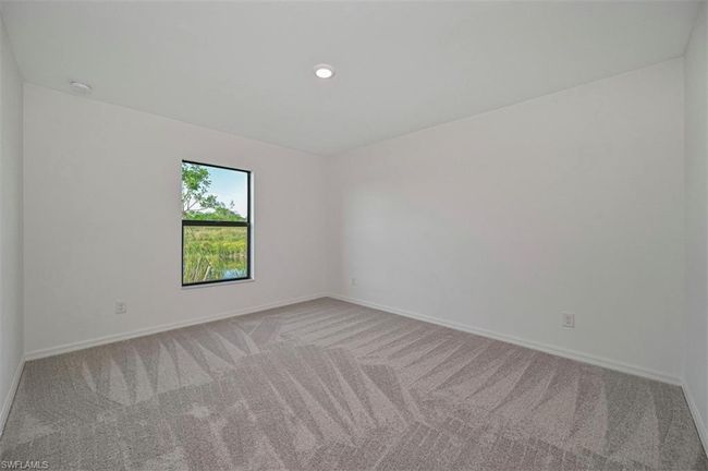 869 General Chesty Puller Ct, House other with 3 bedrooms, 2 bathrooms and 2 parking in LABELLE FL | Image 11