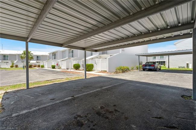 Covered and Close! Just a quick walk to the front door. Best parking spot in the community! | Image 29