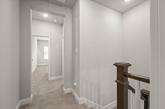 Hall featuring attic access, carpet flooring, an upstairs landing, and recessed lighting | Image 21