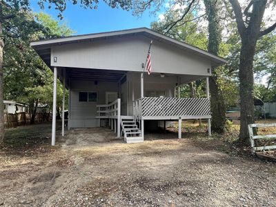 Rear view of property with a carport | Image 1