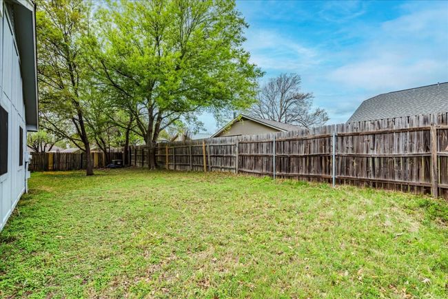View of yard featuring a fenced backyard | Image 25