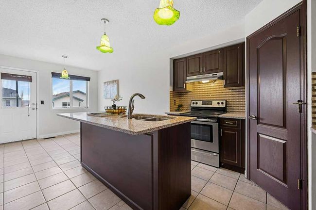 133 Tuscarora Way Nw, Home with 5 bedrooms, 2 bathrooms and 4 parking in Calgary AB | Image 10