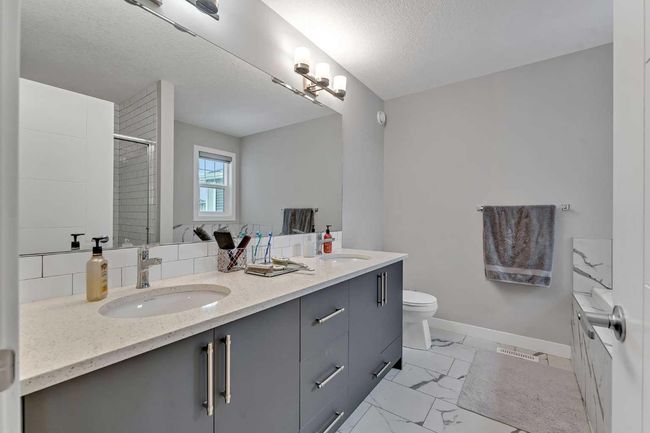 117 Legacy Glen Cir Se, House other with 3 bedrooms, 3 bathrooms and 4 parking in Calgary AB | Image 25