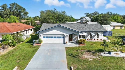 1042 Malay Ter Nw, PORT CHARLOTTE, FL, 33948-3619 | Card Image