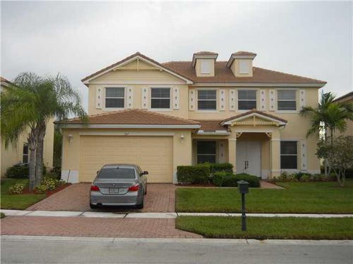 207 Palm Beach Plantation Blvd, Royal Palm Beach, FL, 33411-4558 | Card Image