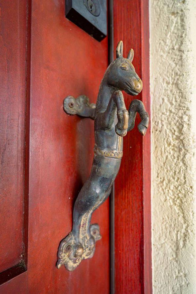 Unique door handle adorns the front | Image 16