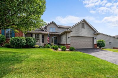 6197 Mountain Laurel Drive, Condo with 4 bedrooms, 3 bathrooms and null parking in Brighton MI | Image 1