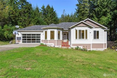 Front of property with heavy duty glass garage door | Image 1