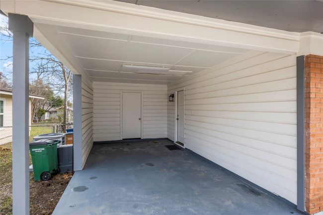 Carport with storage featuring washer/dryer space | Image 20