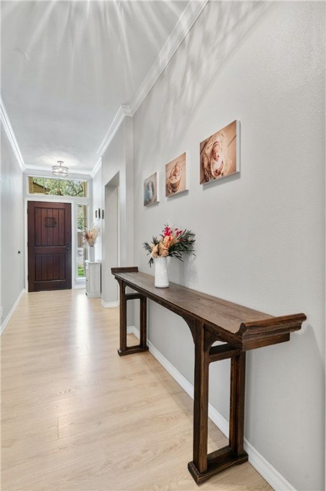 The interior has been thoughtfully updated with trendy modern design elements throughout. | Image 5