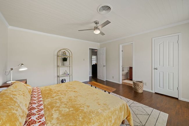 The primary bedroom has a walk-in closet. | Image 18