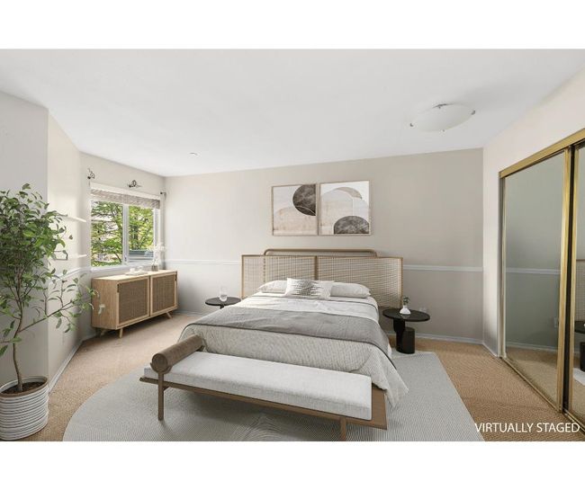 Bedroom with light carpet and a closet | Image 8