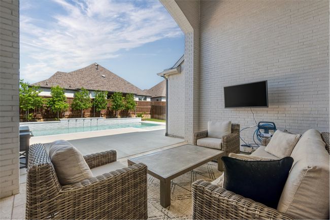 View of pool from covered patio | Image 33