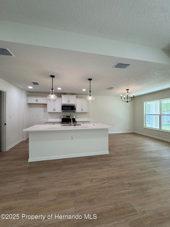 13050 Tinamou Ave, House other with 4 bedrooms, 2 bathrooms and null parking in WEEKI WACHEE FL | Image 4
