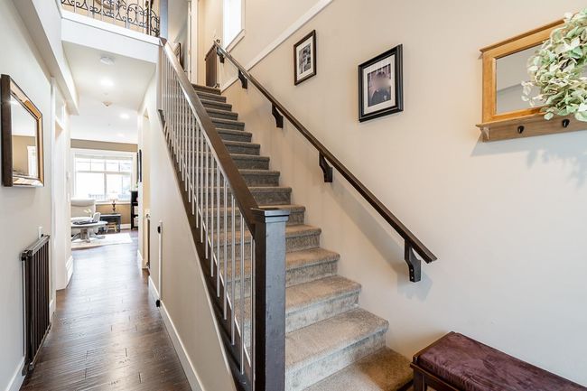 Staircase with wood finished floors, recessed lighting, and baseboards | Image 15