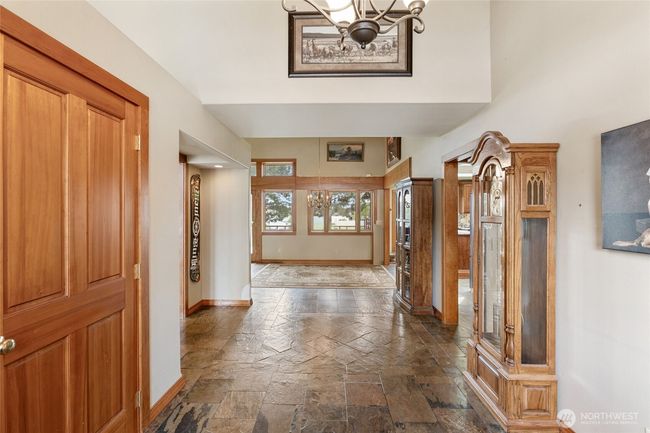 Two large entry closets and slate flooring. | Image 7
