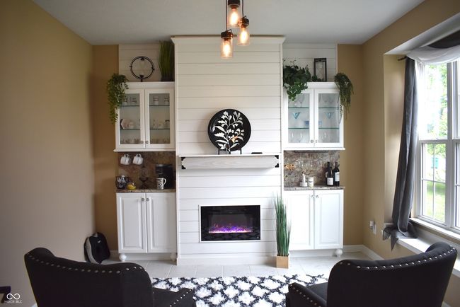 Sitting room with insert fireplace. | Image 11