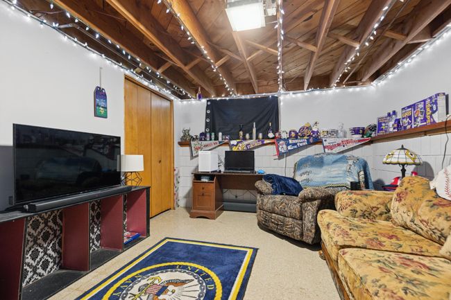 The fourth bedroom is currently serving as an entertainment room. | Image 16