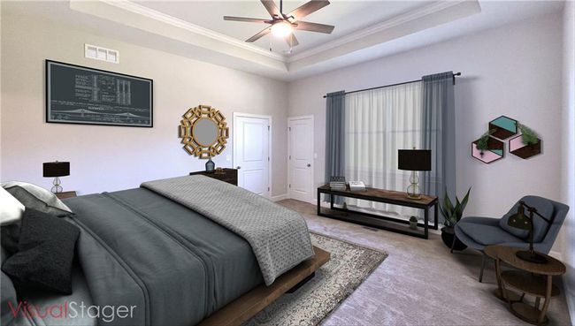 Another view of the spacious primary bedroom, with decorating suggestions. | Image 8