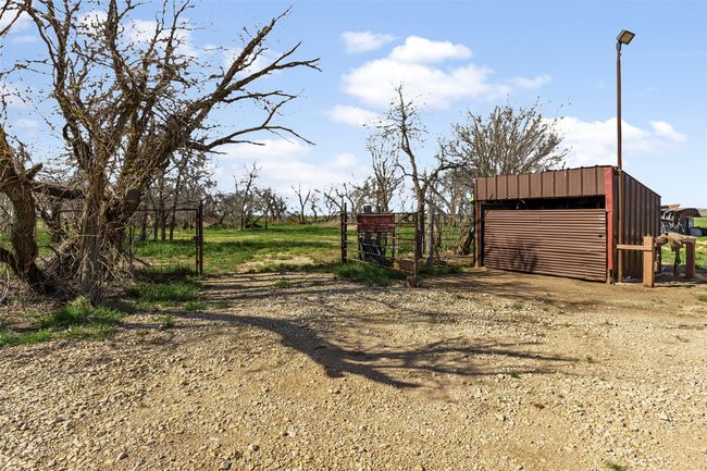 View of yard featuring an outbuilding | Image 23