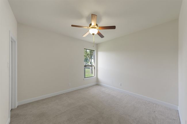 Fourth bedroom opposite side of floorplan with another walk-in closet & ceiling fan! | Image 28