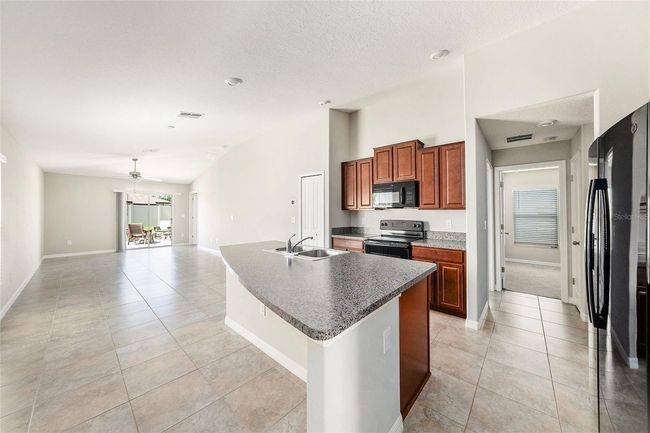 7211 Ozello Trail Ave, House other with 3 bedrooms, 2 bathrooms and null parking in SUN CITY CENTER FL | Image 10