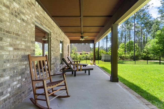 9241 Sage Forest Ln, House other with 3 bedrooms, 3 bathrooms and 2 parking in Pace FL | Image 34