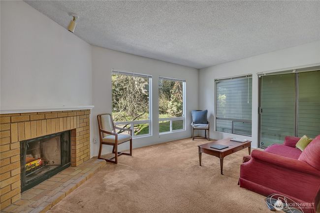 Livingroom With wood burning Fireplace | Image 8