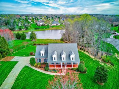 7878 Bufflehead Court, House other with 4 bedrooms, 3 bathrooms and null parking in Greensboro NC | Image 2