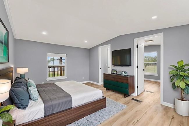 VITUALLY STAGED. Master Bedroom with multiple windows | Image 24