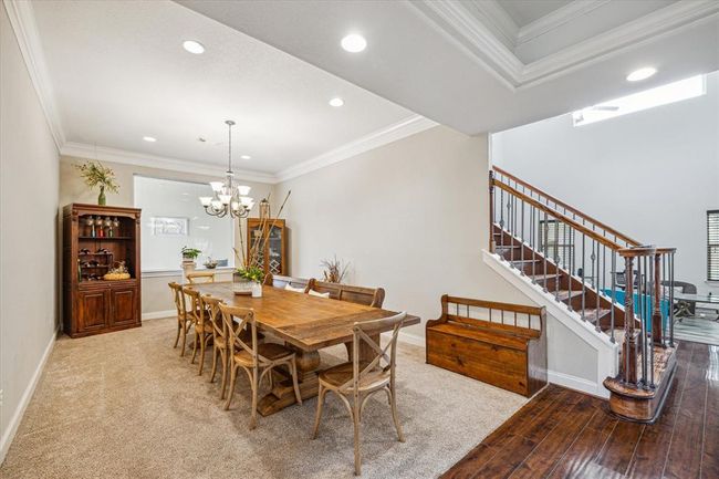 Grand dining room just to the left of main entryway. New laminate wood floors put in 2023 | Image 7
