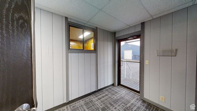 Unfurnished room featuring a paneled ceiling and baseboards | Image 20