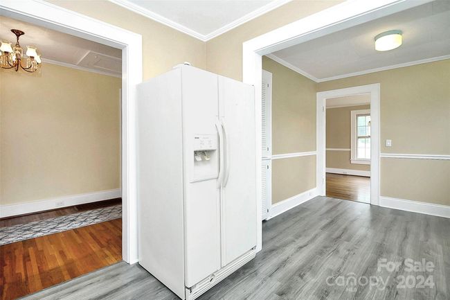 Kitchen view into sitting area and hallway | Image 15