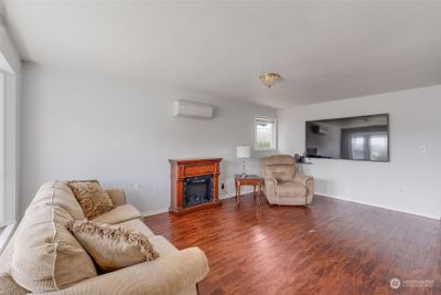 Living room. TV stays. Flooring allowance offered. | Image 3