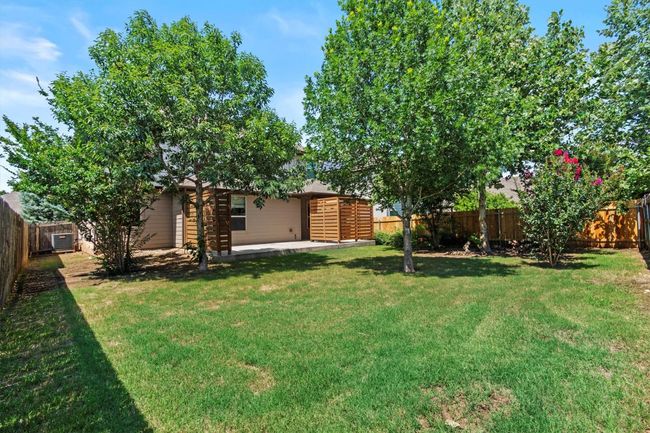 View of yard with a patio area and central AC unit | Image 35