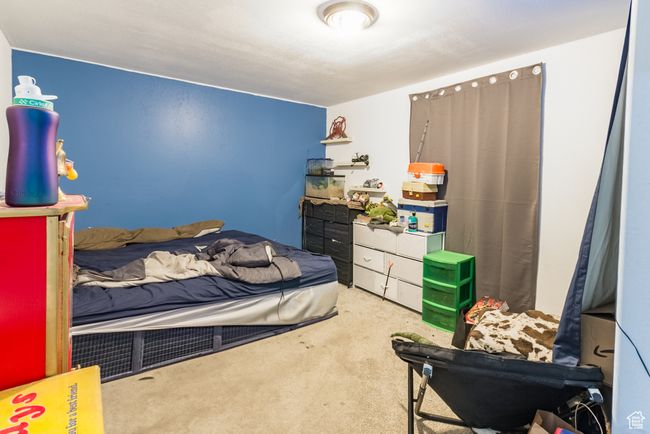 Bedroom with carpet floors | Image 20