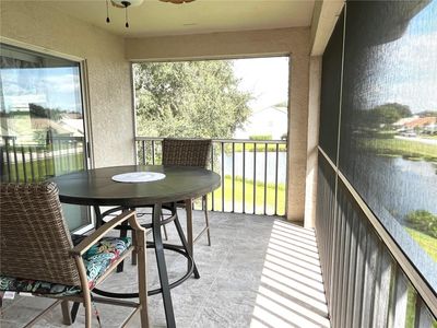 Expansive enclosed lanai overlooking pond/6th tee box | Image 2