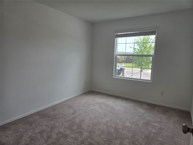 Empty room featuring carpet floors and baseboards | Image 5