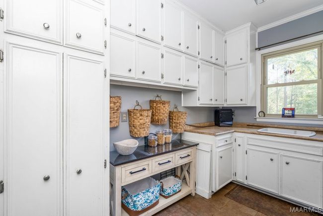 Storage galore and tall broom closet | Image 37