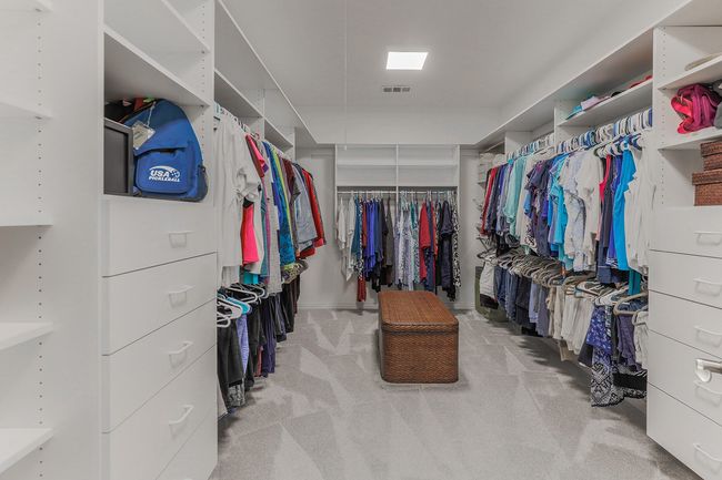Expansive closet with closet organization system | Image 29