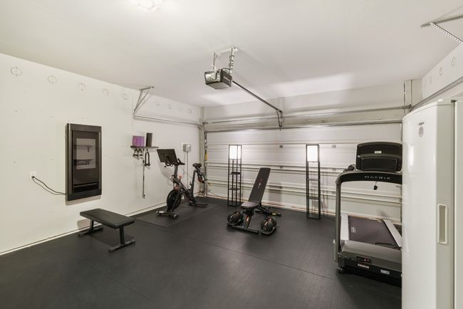 Insulated 2 car garage used as a workout room. Workout equipment negotiable. | Image 34