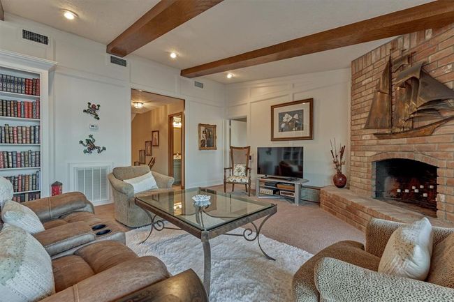 The primary bedroom is just beyond for comfortable living all on one level. | Image 11