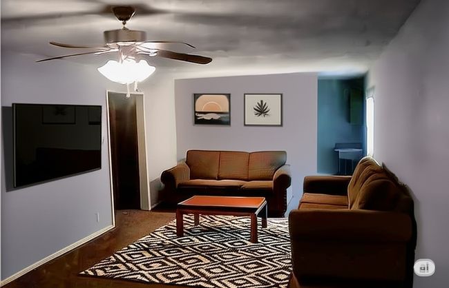 Living room featuring a ceiling fan and wood finished floors | Image 4