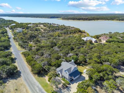 Plenty space between properties with great tree cover. | Image 3