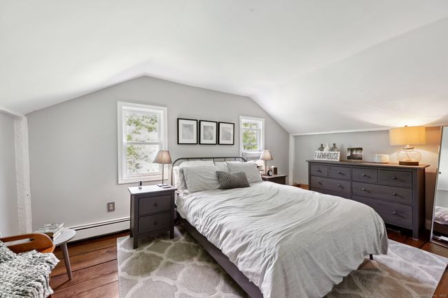 Upper level bedroom with hardwood floors | Image 17