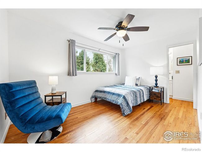 this main floor bedroom has an ensuite bath | Image 12