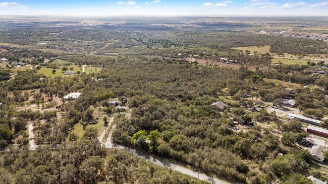 Aerial view of property's location with a forest | Image 21