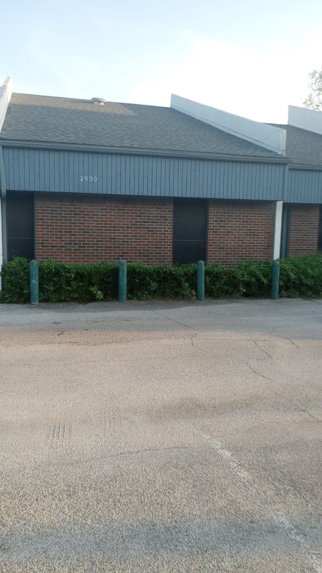 View of property exterior featuring brick siding | Image 9